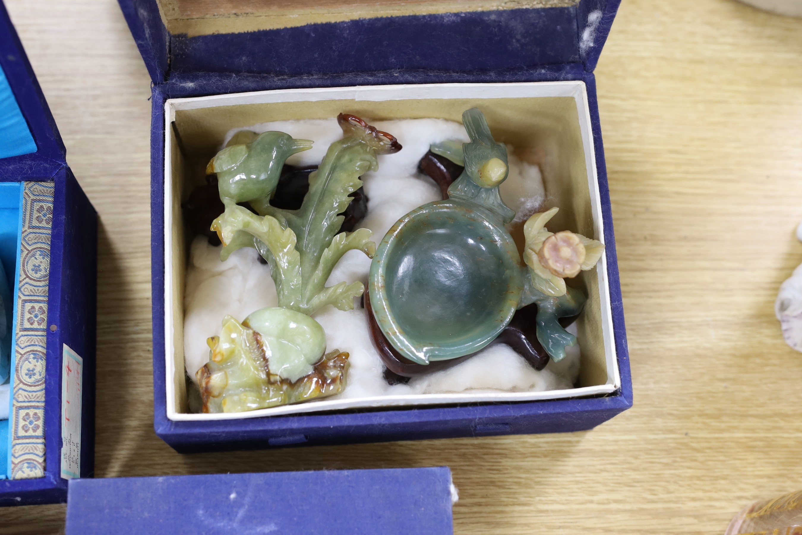 Four assorted boxed of jades and bowenite jades and a blanc de chine figure, 26.5cms high